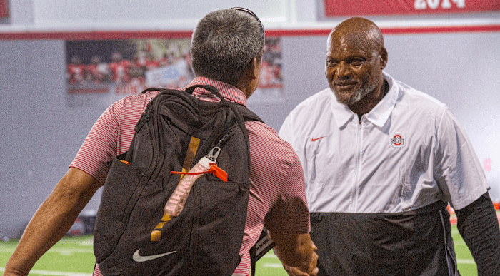 Brandyn Akana with Larry Johnson - Andrew Lind/BuckeyesNow